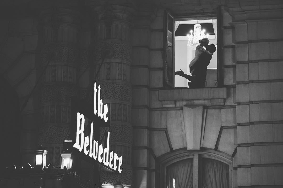 image of couple in window at the belvedere hotel