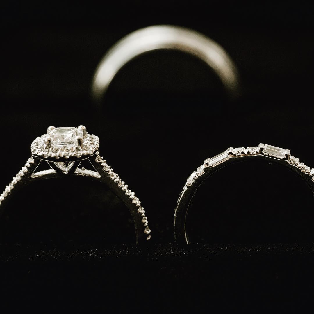 A close-up detail shot of two wedding rings