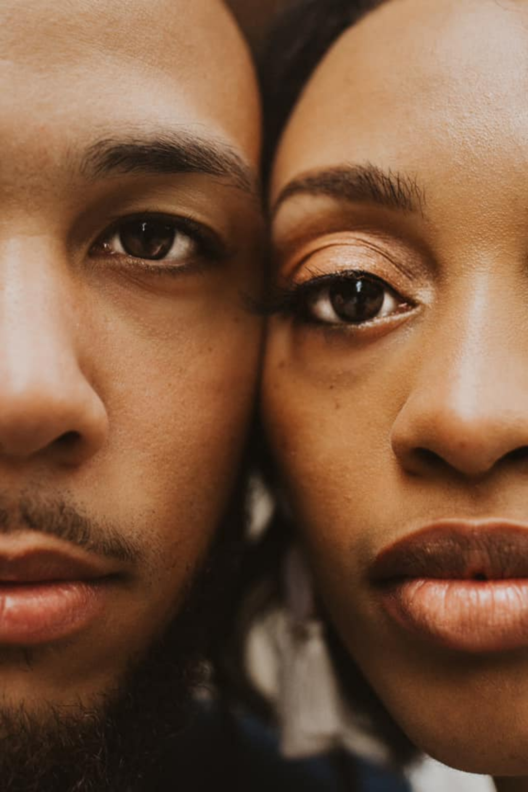 A close up shot of a bride and groom's faces aligned side by side