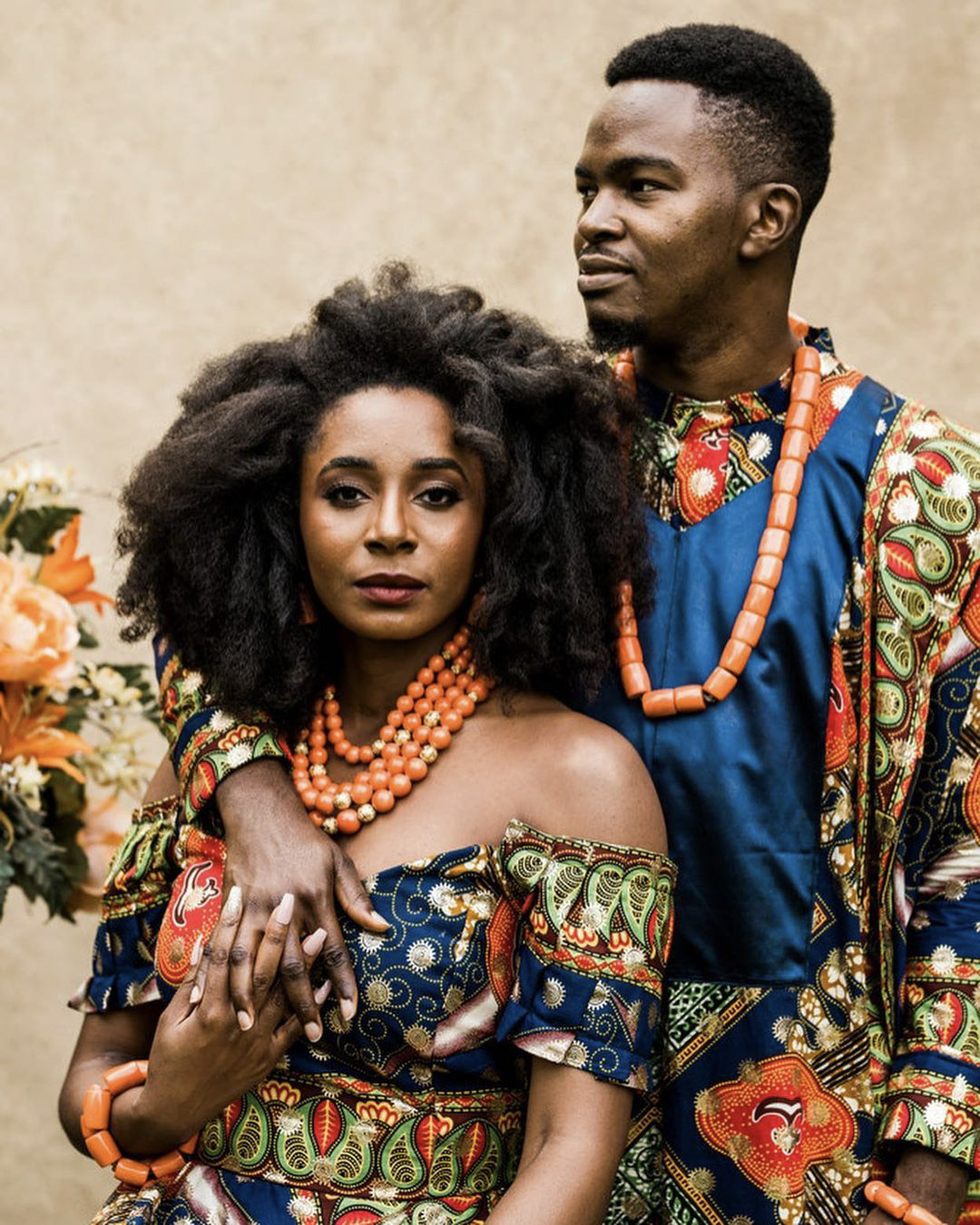 A bride and groom in cultural clothing 