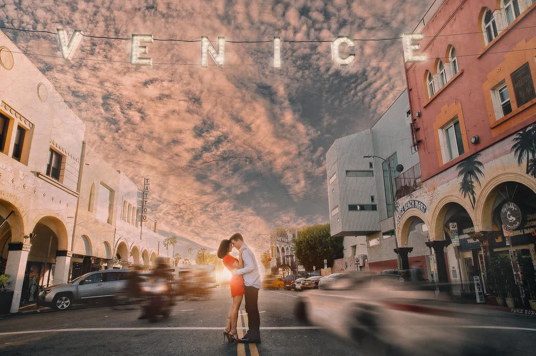 Engagement photography in the middle of a busy street.