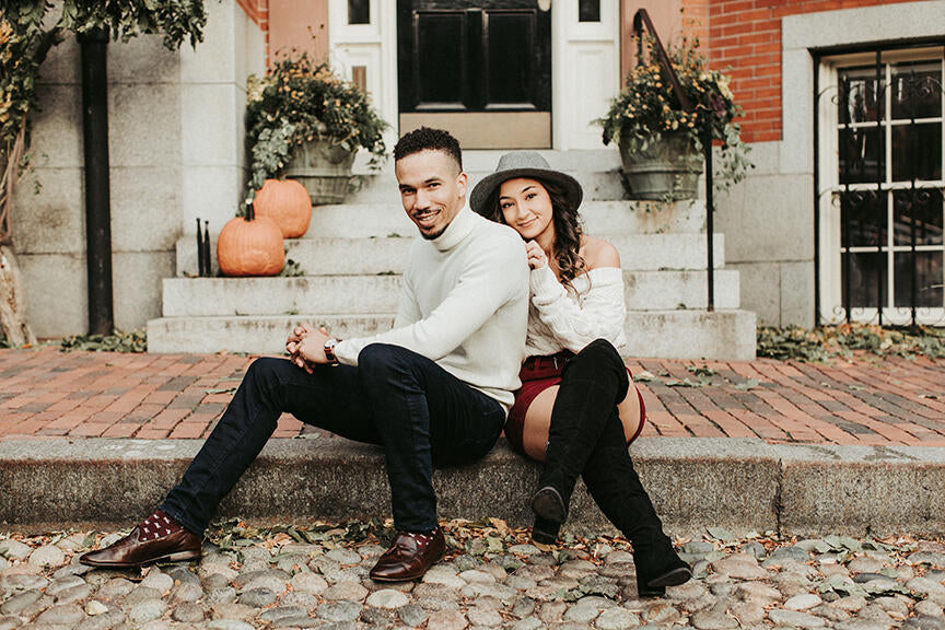 Couples posing for an engagement session