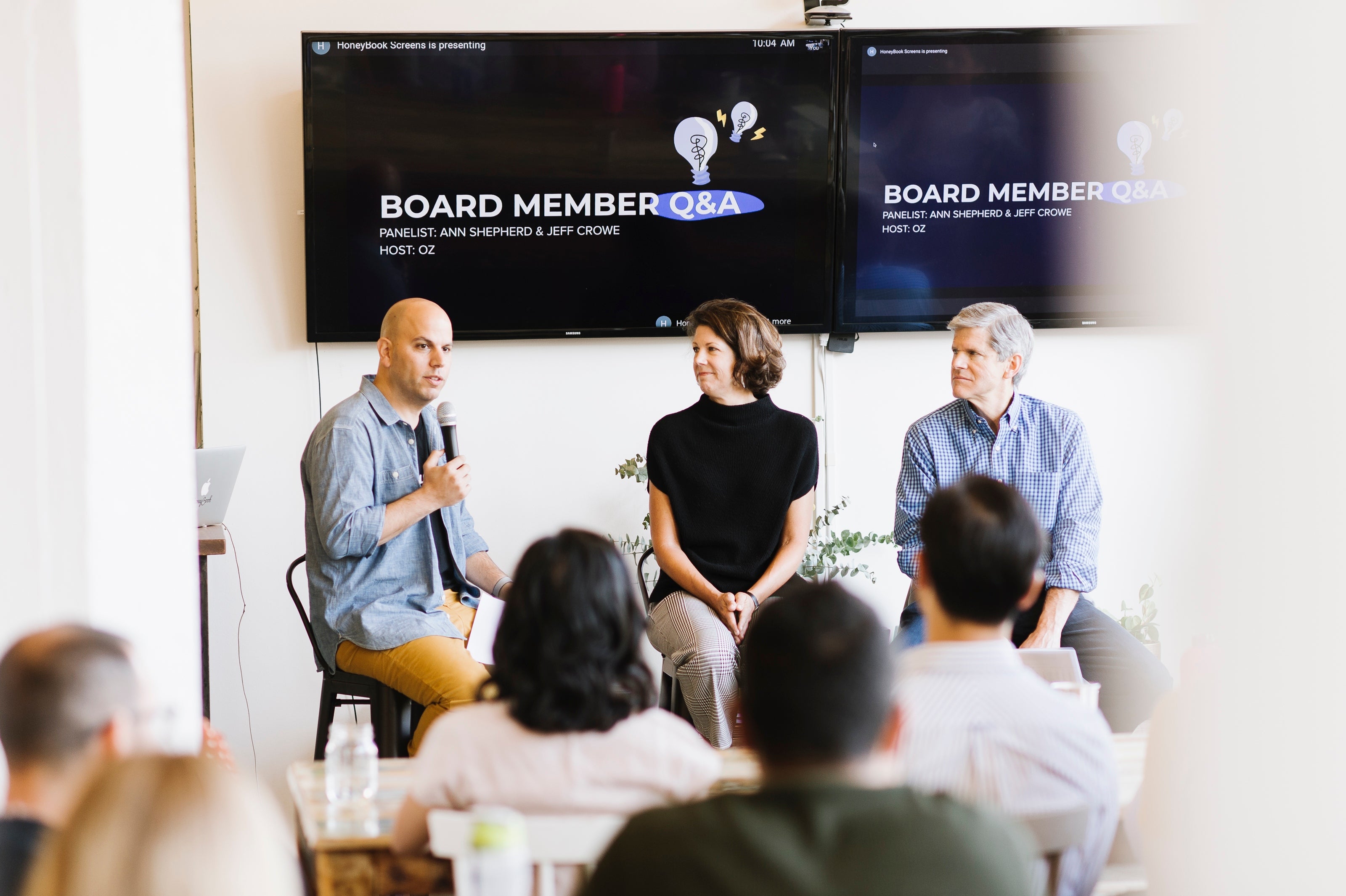 Board member question and answer meet at HoneyBook's office