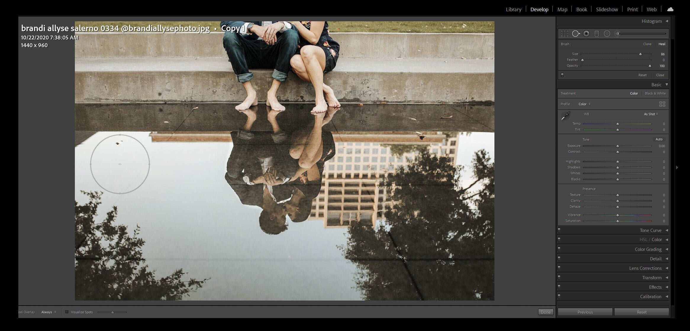 urban reflection of two people showing their feet