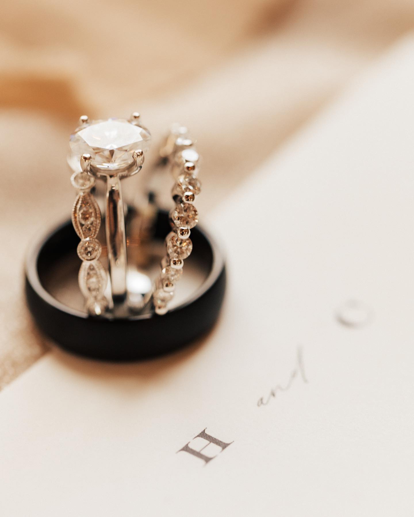 a close up image of a set of wedding rings