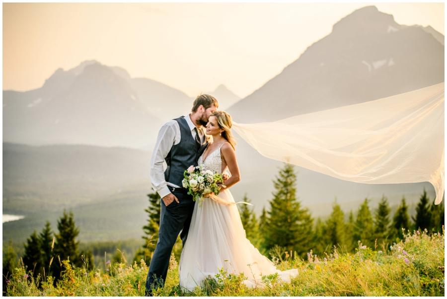 couple in wedding clothes at sunset