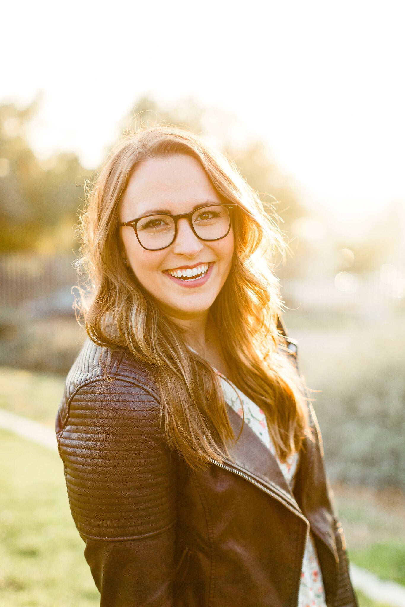 A portrait of Natalie Franke, the Head of Community at HoneyBook (a client management software)