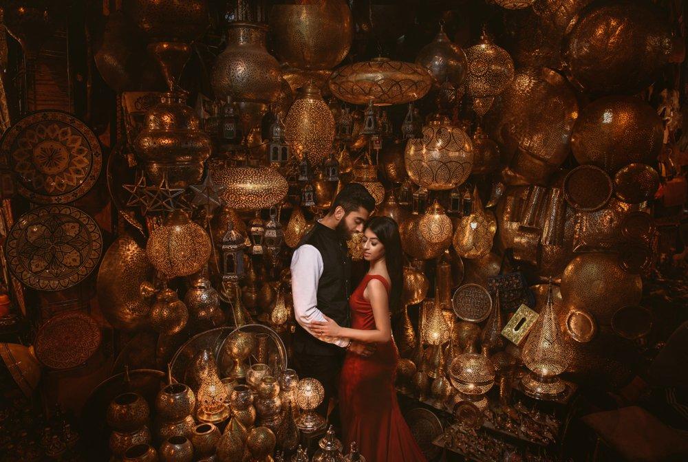 A couple posing for a perfect shot around lanterns