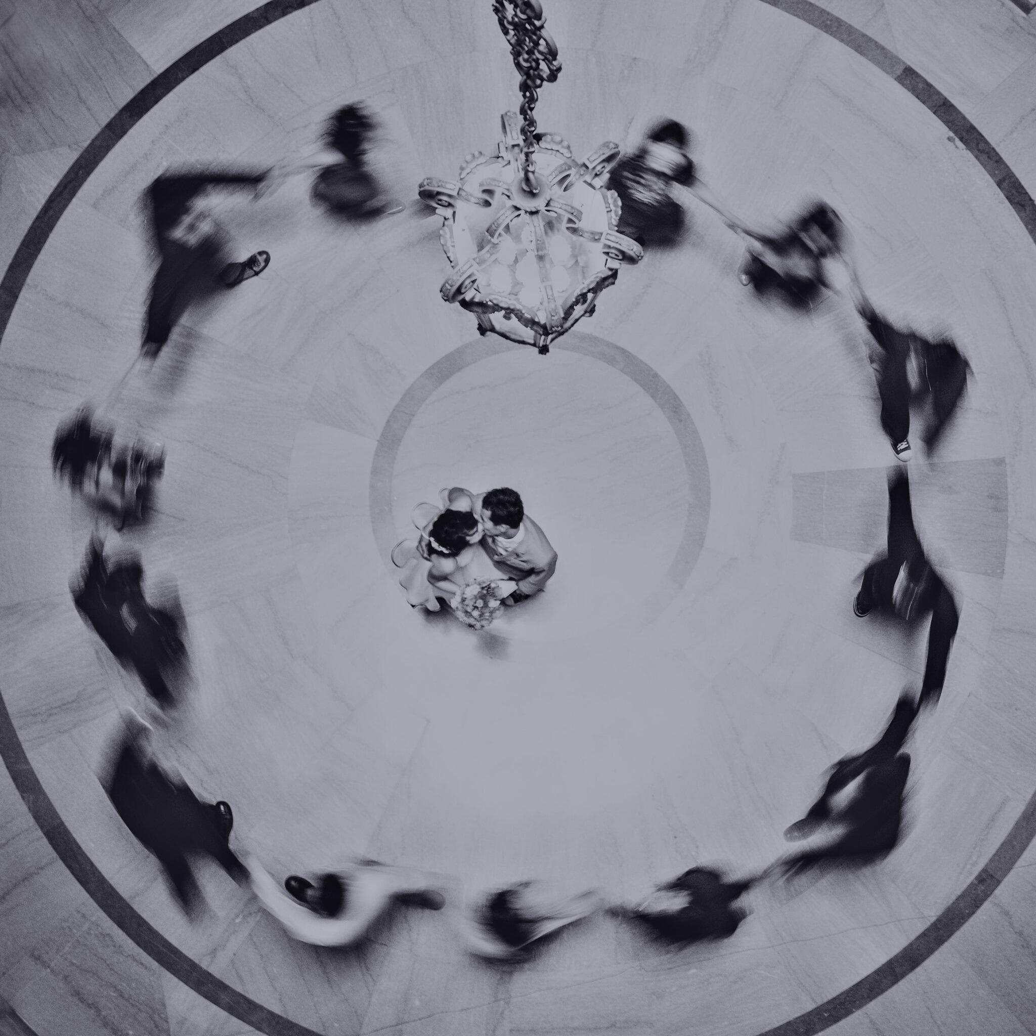 photo of couple dancing on dance floor from above