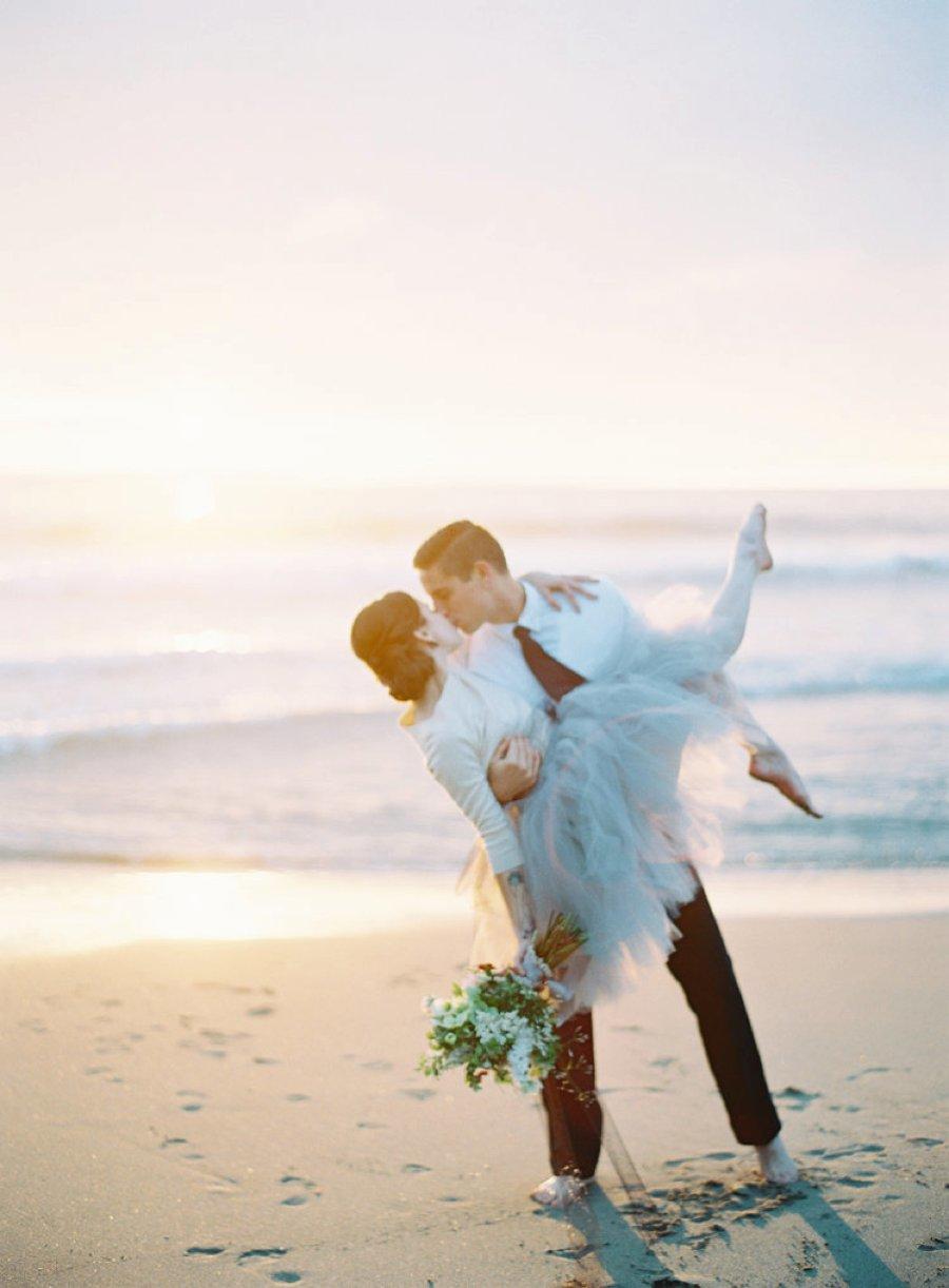 A couple posing at the beach