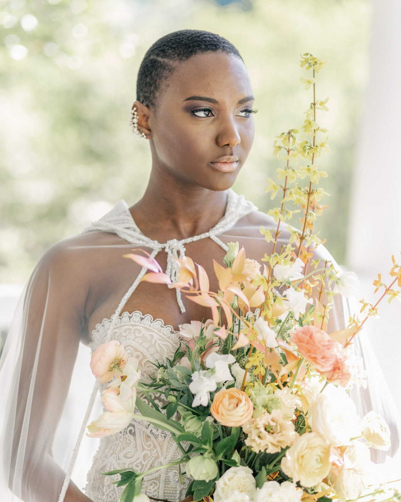 a wedding bride holding her bridal bouquet