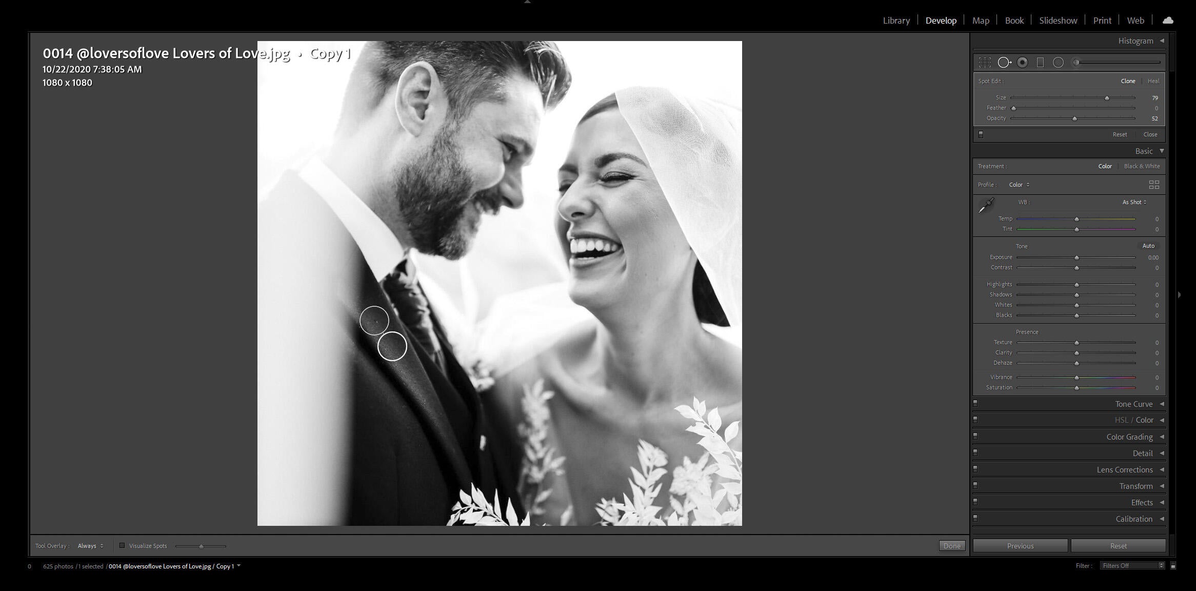 black and white image of groom and bride laughing