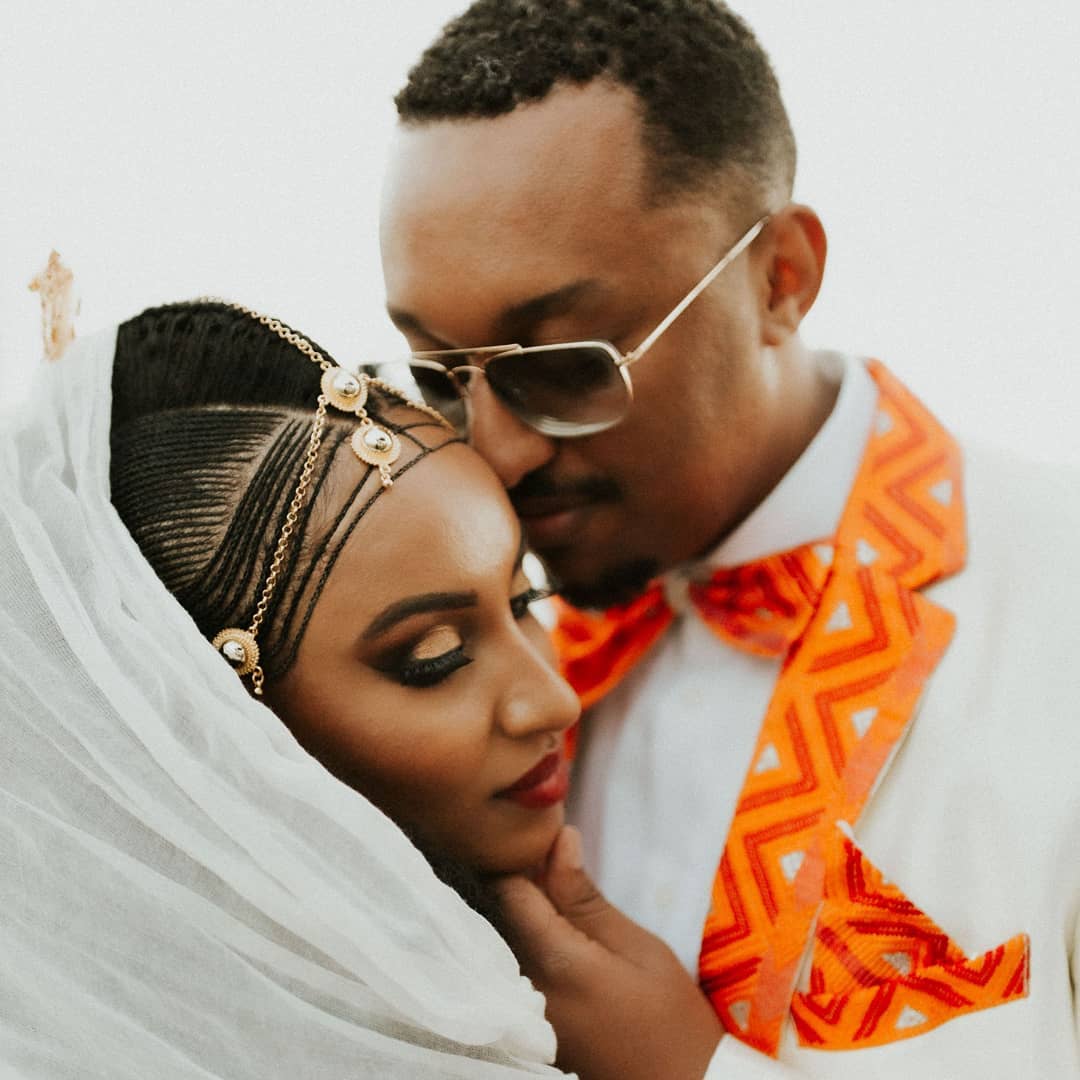 Mid close-up portrait of a bride and groom