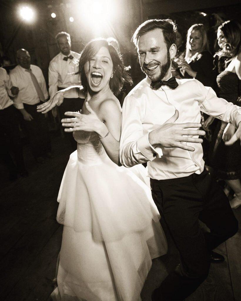 a wedding couple dancing on their wedding reception