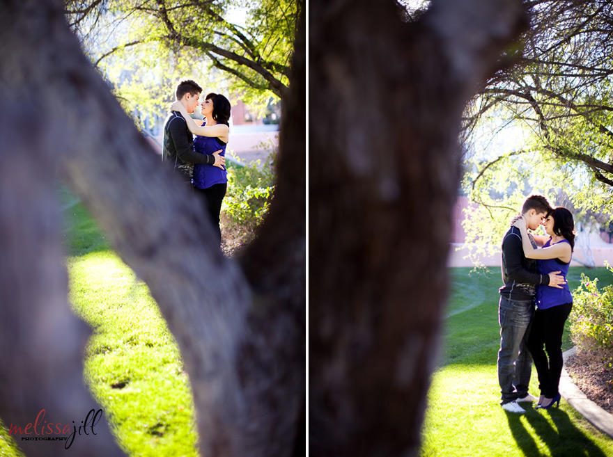 Two engagement photos of the couple in an embrace, facing one another, with tree branches in the foreground and background.