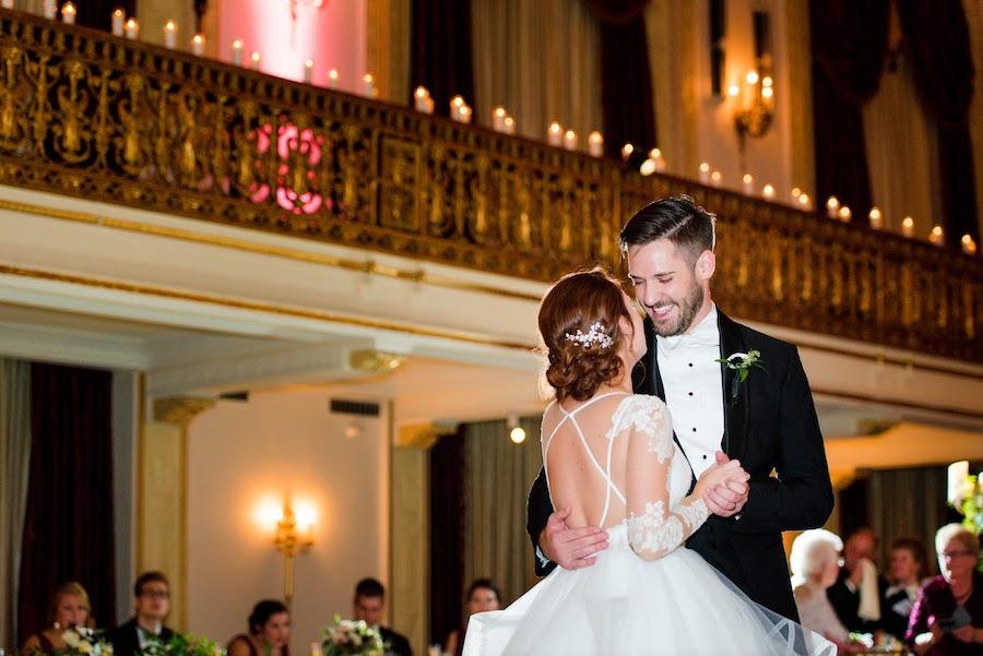 A bride and groom on the dance floor during their first dance