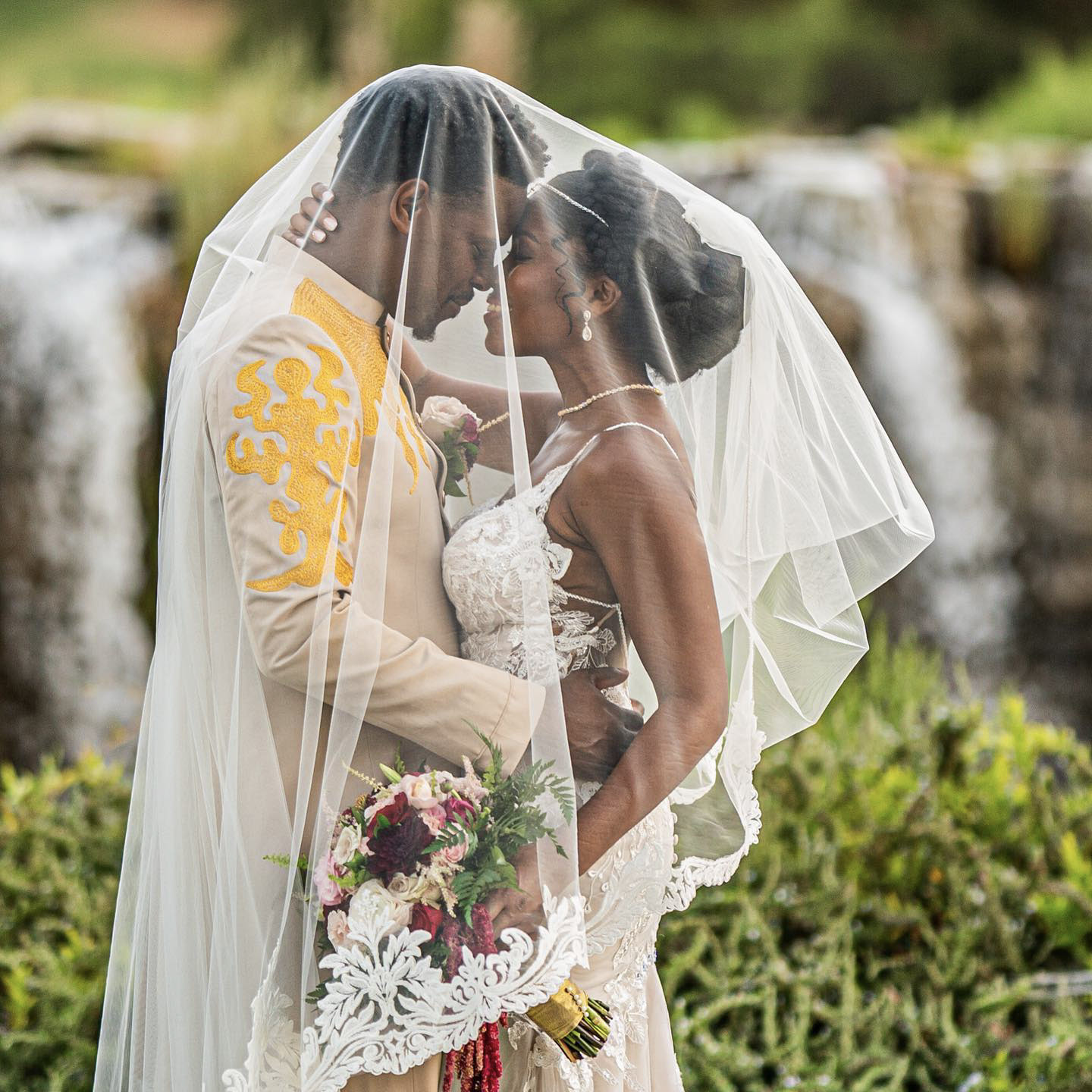 a bride and a groom sharing an intimate moment in the 