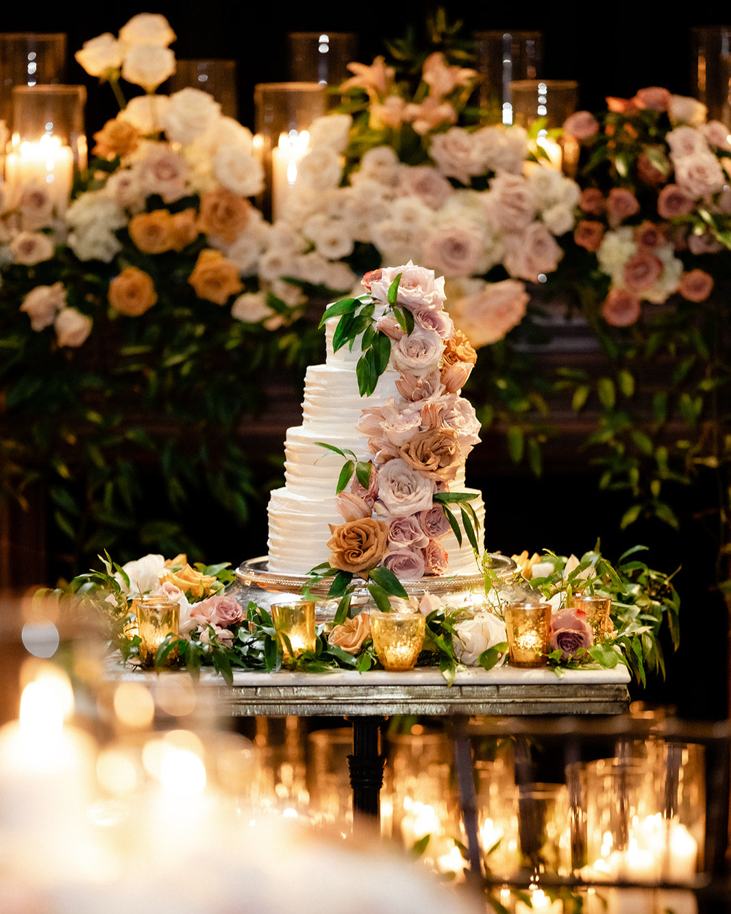 a decorated wedding cake for a wedding reception 