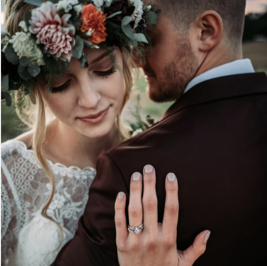 groom smelling brides hair