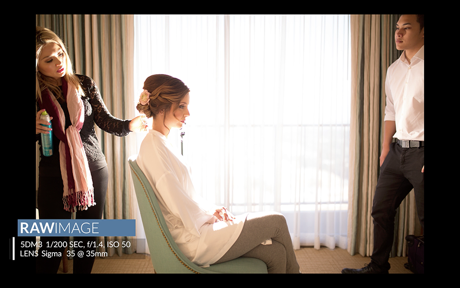 Raw image of a hairstylist setting the bride's hair in an off camera flash setup